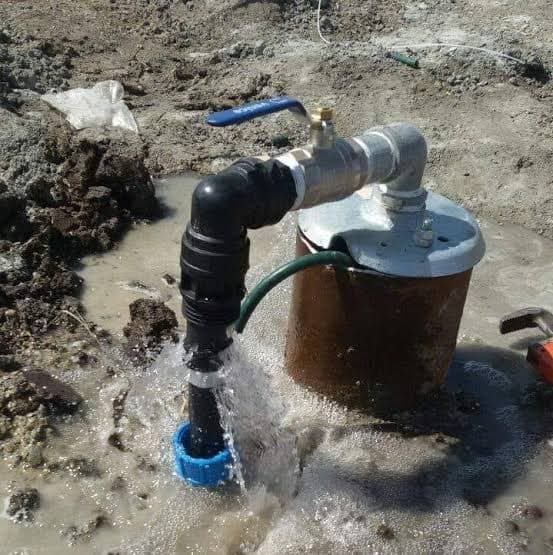 Borehole rig and water spray